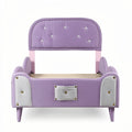 **Child's Upholstered Bed with Star Design and Accent Colors**